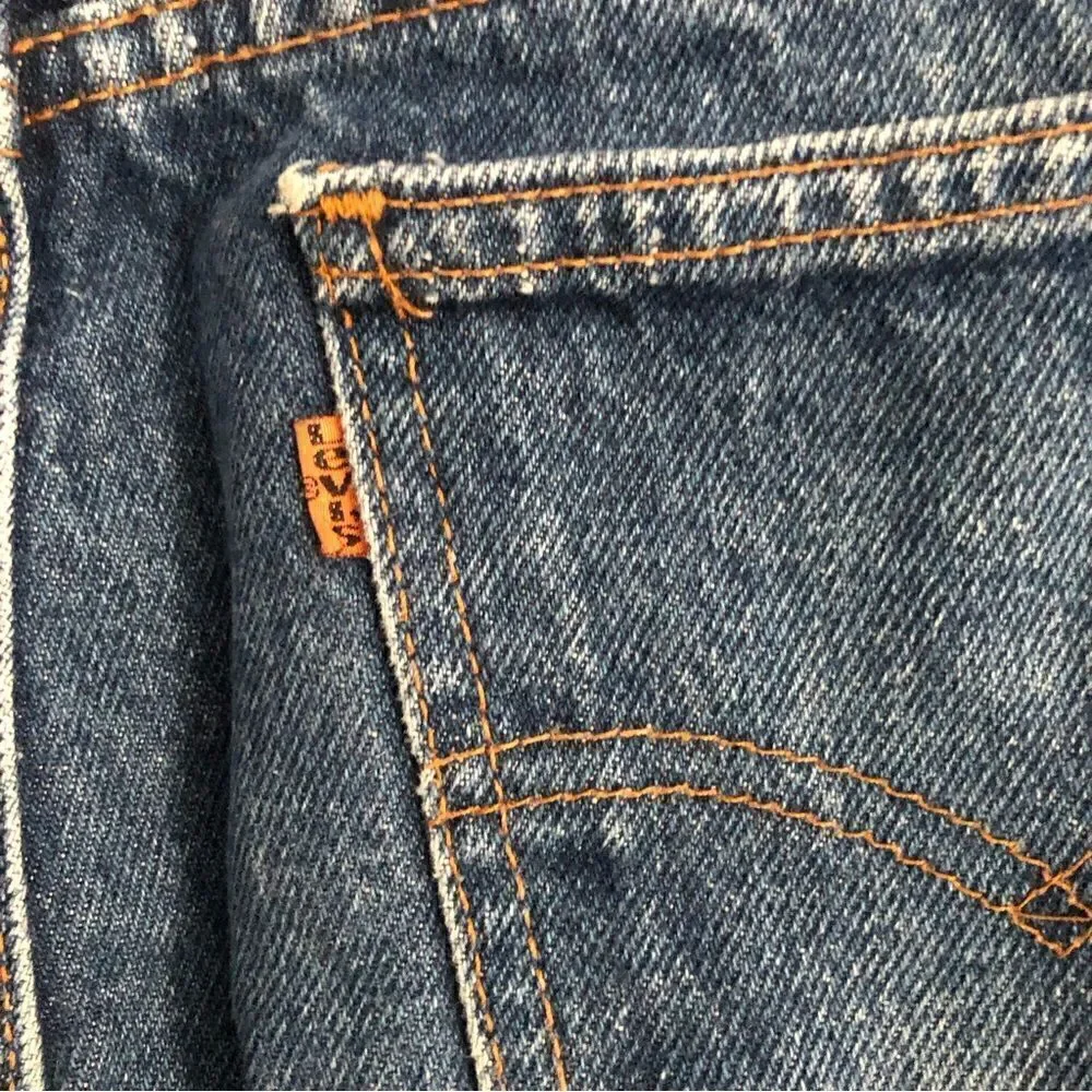 Vintage Levi’s 509 orange tag medium blue wash denim jeans size 33x31